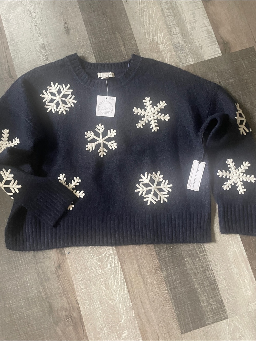 cupcakes & cashmere Navy Crewneck Sweater with White Snowflake Appliqués